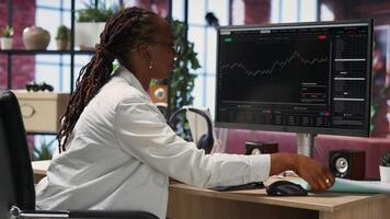 Day trader using PC, upset after purchased stocks performed bad and lost value, throwing paperwork. Forex trader frustrated after missing window of opportunity to sell stock exchange, camera B video