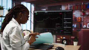 Day trader using PC, upset after purchased stocks performed bad and lost value, throwing paperwork. Forex trader frustrated after missing window of opportunity to sell stock exchange, camera A video
