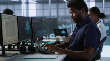AI system administrator in server room listening music, developing disaster recovery plans ensuring minimal downtime. Neural networks specialist in data center monitoring performance, camera A video