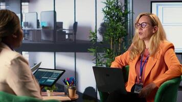 Female officials in a corporate environment sharing big ideas and strategies for career development, achieving goals in a men dominated world. Multicultural team exemplifying leadership. Camera A. video