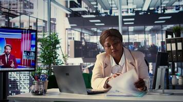 Ambitious female leader focusing on strategic planning and business success, setting a clear vision and objectives for the enterprise. Black director achieving organizational growth. Camera B. video