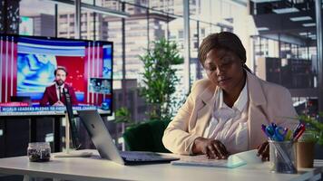 Black female CEO strategically planning activity for business growth and global development, demonstrating leadership qualities and goal orientation. Dedication to corporate success. Camera B. video