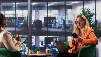 Female leader contacting partners via smartphone conference call, discussing about latest developments and investments. Woman business manager speaking on remote phone call, decision maker. Camera A. video