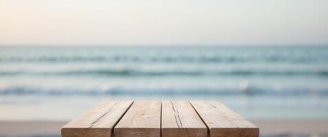 Wooden Table Top with Blurred Summer Beach Scene and Soft Ocean Background Ideal for Relaxation and Vacation Themes photo