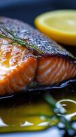 Perfectly cooked salmon steak with rich flavor and flaky texture garnished with fresh herbs and lemon slices photo