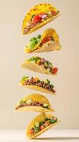 Colorful stack of Mexican tacos filled with beef and fresh ingredients displayed artistically for a delicious culinary experience photo
