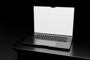 A laptop computer sitting on a table with a blank screen photo
