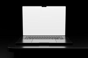 A laptop on a desk with a blank screen photo