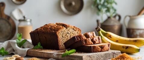 Deliciously Baked Banana Bread with Sliced Bananas on Wooden Board Surrounded by Fresh Ingredients and Rustic Kitchen Decor photo
