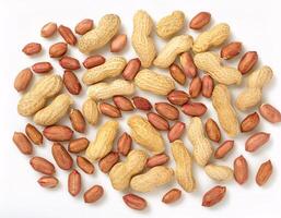 Top View of Raw Peanuts Isolated on White Background photo