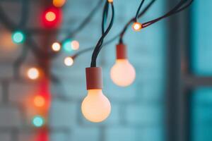 Warm light bulbs illuminate a cozy indoor space decorated with colorful festive lights during the evening hours photo