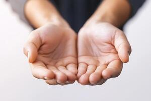 Open hands reach out to offer support and connection in a warm, inviting gesture of kindness photo