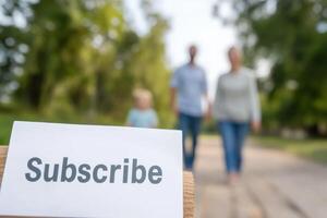 Family walking together in a park with a subscribe sign in focus on a sunny day photo