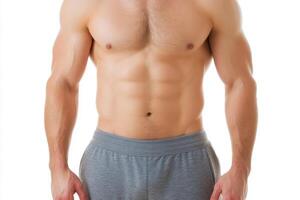 Muscular male torso showcasing defined abs and strong physique against a plain background photo