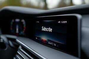 Display screen in a modern car shows subscribe notification while driving on a sunny day photo