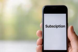 Mobile device displays subscription notification with blurred background highlighting user interaction and technology engagement photo
