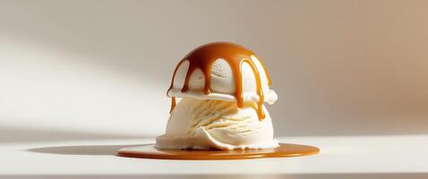 Enjoy the delicious ice cream generously topped with a rich and smooth caramel drizzle. photo