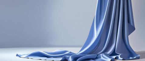 Luxurious blue silk fabric background with soft folds and elegant drape for design. photo