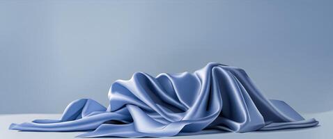 Luxurious blue silk fabric background with soft folds and elegant drape for design photo