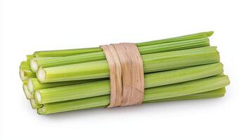Vibrant bunch of fresh green celery tied with twine showcasing versatility and health benefits photo