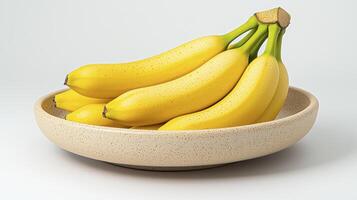 Vibrant yellow bananas elegantly displayed in a textured speckled bowl on a clean white background photo
