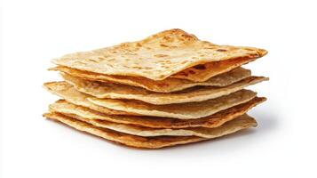 Stack of golden-brown flatbreads with crispy texture displayed against a clean white background for culinary presentation photo