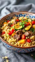 Couscous with vegetables and meat photo