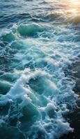 Ocean waves at sunset photo