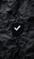 A black and white check mark on a rock wall photo