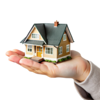 A Small Model House Resting Gently in an Open Palm Offering a Visual Representation of Homeownership and Real Estate png