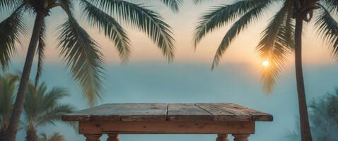 Sunrise Over Palm Trees with Rustic Wooden Table in Foreground Ideal for Outdoor Dining or Relaxation Themes. photo