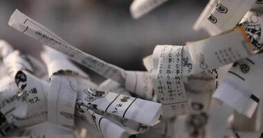 Oracles at Kanda shrine in Tokyo daytime closeup video