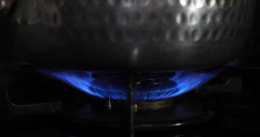Ignition of the heat under the pot in the kitchen video