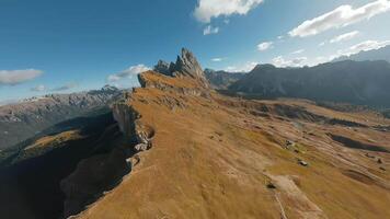 Smooth flight along the mountain range, filmed by FPV drone. Seceda, Italy video