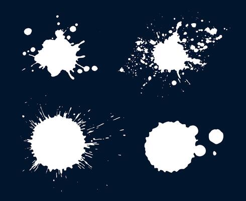 Set of abstract white ink splatters and paint drops on a dark background, ideal for grunge, artistic, and creative designs