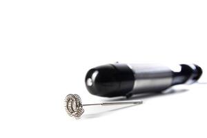 Modern immersion blender with a cappuccino maker attachment on a white background, isolate. Copy space for text photo