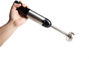 Modern immersion blender with a chopper in hand on a white background, isolate. photo