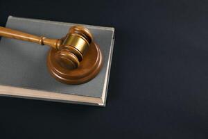 Judge gavel with books on the table photo