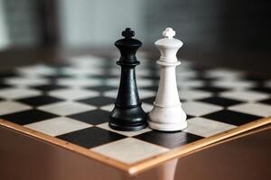 Chess figures on a chessboard. photo