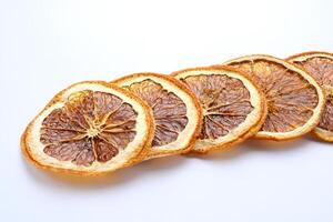 Dried orange slices isolated on white background photo