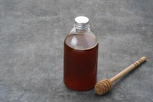 Honey bee in a bottle photo