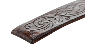 Decorative leather strap with intricate swirl patterns displayed on a transparent background. png