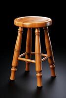 A wooden stool on a black background photo