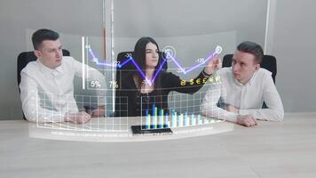Financiers who use a transparent graphic display to monitor exchange rates and the dynamics of cryptocurrency growth against the dollar and the euro. finances of the future video