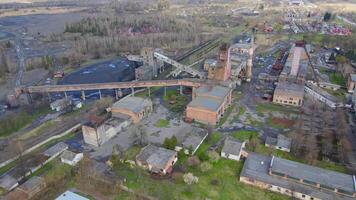 Aerial view Industrial coal mining at the mine. Mountains of coal lying on an old mine. video