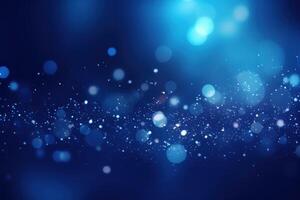 Abstract blue bokeh background with floating dust particles photo