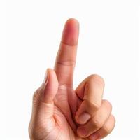 Hand pointing with index finger on white background photo