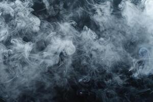 White smoke creating abstract shapes on dark background photo