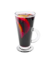 Delicious warm beverage with spices and fruits served in a clear glass during a chilly evening photo