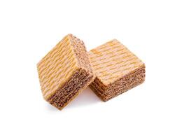 Crunchy layered wafers stacked on a clean white background highlighting their texture and design photo